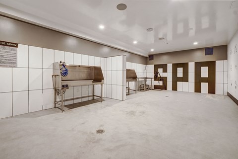 A room with a sign that says "The Spa" on the wall.